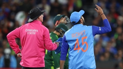 India's Rohit Sharma gestures as he talks to umpire Rod Tucker after the ball hit a TV camera (AP) India's Rohit Sharma gestures as he talks to umpire Rod Tucker after the ball hit a TV camera (AP)