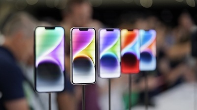 iPhone 14 models on display at an Apple event in Apple's headquarters. (AP)