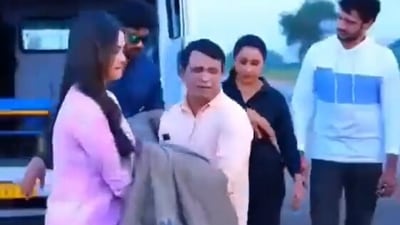 The image is taken from the viral video showing a daily soap's bizarre 'plastic surgery on road' scene. (Screengrab)