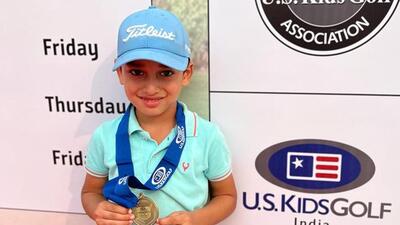 Golfer Nihaal Cheema with his gold medal at the US Kids Golf Championship, Golden Greens, Gurgaon. (HT Photo)