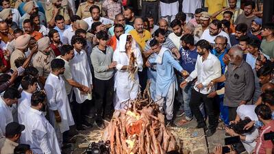 Relatives and family members of Shiv Sena (Taksali) leader Sudhir Suri, who was shot dead, perform his cremation in Amritsar on Sunday. (PTI) Relatives and family members of Shiv Sena (Taksali) leader Sudhir Suri, who was shot dead, perform his cremation in Amritsar on Sunday. (PTI)