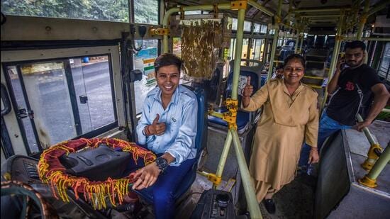 Pooja, a 22-year-old DTC woman driver on the bus from Najafgarh to Mehrauli bus depot, in New Delhi. (Raj K Raj/HT Photo)