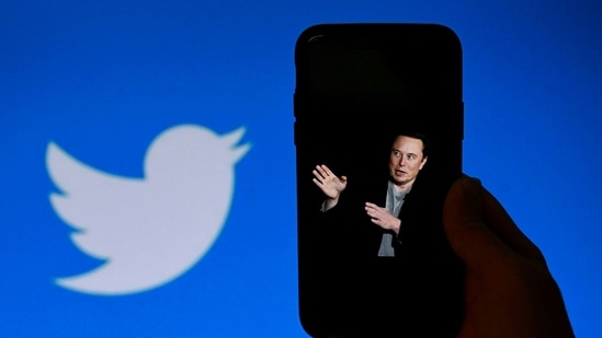 Elon Musk Twitter Takeover: A phone screen displays a photo of Elon Musk with the Twitter logo.(AFP)