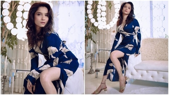 For the photoshoot, Ankita Lokhande slipped into a printed jade blue dress from the shelves of the clothing label Massimo Dutti. The television actor blossomed into a badass woman with no fear in this sultry avatar and garnered several compliments from her fans.(Instagram)