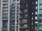 Dubai Fire: Investigators examine fire damage at the high-rise 8 Boulevard Walk in Dubai.(AP) Dubai Fire: Investigators examine fire damage at the high-rise 8 Boulevard Walk in Dubai.(AP)