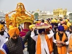 Nagar Kirtan - a religious procession being carried out by the devotees. Nagar means a suburb, town or city and Kirtan refers to the singing of Gurbani. It is the ritual where holy hymns are sung.(Sameer Sehgal /Hindustan Times)