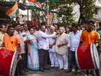People celebrate Supreme Court's decision to upheld the 10 per cent reservation for economically weaker sections (EWS) in admissions and government jobs, in Thane, Monday. (PTI) People celebrate Supreme Court's decision to upheld the 10 per cent reservation for economically weaker sections (EWS) in admissions and government jobs, in Thane, Monday. (PTI)
