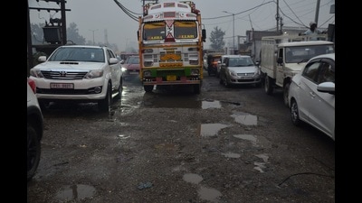 The pothole riddled road opposite SPS Apollo Hospital in Sherpur Chowk, Ludhiana. (Harvinder Singh/HT) The pothole riddled road opposite SPS Apollo Hospital in Sherpur Chowk, Ludhiana. (Harvinder Singh/HT)