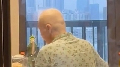 China: The video was taken by a Chinese man of his cancer-stricken mother. China: The video was taken by a Chinese man of his cancer-stricken mother.