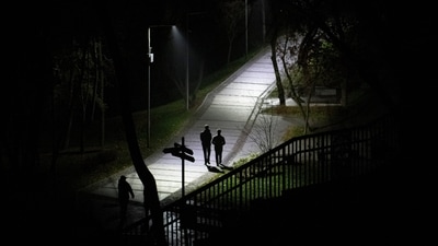 Russia-Ukraine War: People walk in a park during a blackout in Kyiv, Ukraine. (AP)