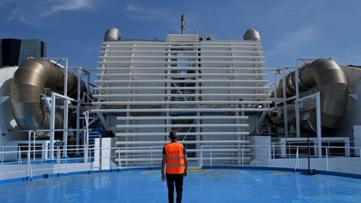A worker walks towards the particle filter on the upper deck of the ferry Piana docked in Marseille harbour. (AFP) A worker walks towards the particle filter on the upper deck of the ferry Piana docked in Marseille harbour. (AFP)