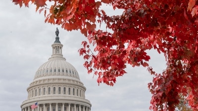 US Midterm Elections: Red autumn leaves frame the US Capitol. (AP) US Midterm Elections: Red autumn leaves frame the US Capitol. (AP)