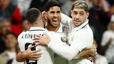Real Madrid's Marco Asensio celebrating with teammates (REUTERS)