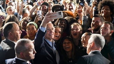 US Midterm Elections: US President Joe Biden poses for a selfie with supporters. (AFP) US Midterm Elections: US President Joe Biden poses for a selfie with supporters. (AFP)