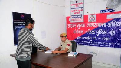 Gurugram, India - November 06: Nuh police have set up a cyber help desk in a bid to deal with the cyber crime cases, in Gurugram, India, on Sunday, November 6, 2022. (Photo by Parveen Kumar/Hindustan Times)**To go with Leena Dhankar's story** Gurugram, India - November 06: Nuh police have set up a cyber help desk in a bid to deal with the cyber crime cases, in Gurugram, India, on Sunday, November 6, 2022. (Photo by Parveen Kumar/Hindustan Times)**To go with Leena Dhankar's story**