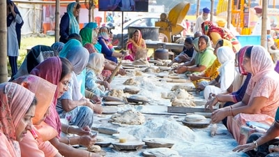Devotees prepare 'langar' as part of birth anniversary celebrations of Sikhism founder. The day is celebrated with grandeur across India and other parts of the world where the Punjabi diaspora reside. (PTI) Devotees prepare 'langar' as part of birth anniversary celebrations of Sikhism founder. The day is celebrated with grandeur across India and other parts of the world where the Punjabi diaspora reside. (PTI)