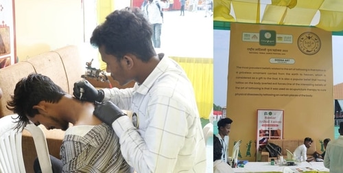 A youngster gets a tattoo at the Godna Art Stall (CMO) A youngster gets a tattoo at the Godna Art Stall (CMO)
