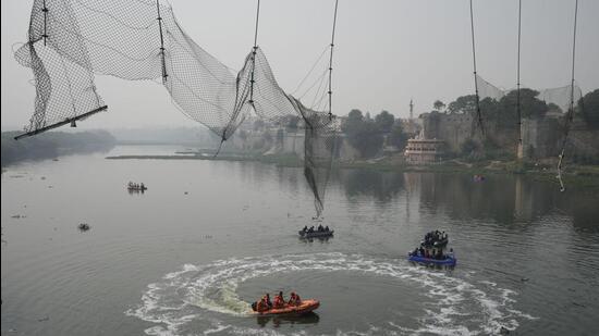 The bridge collapse in Morbi last month left 135 people dead. (AP) The bridge collapse in Morbi last month left 135 people dead. (AP)