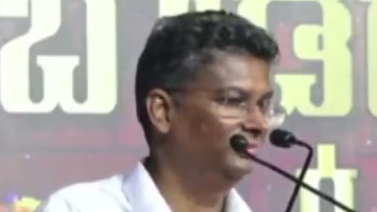 Karnataka Congress working president Satish Jarkiholi speaks at an event. (ANI video grab))