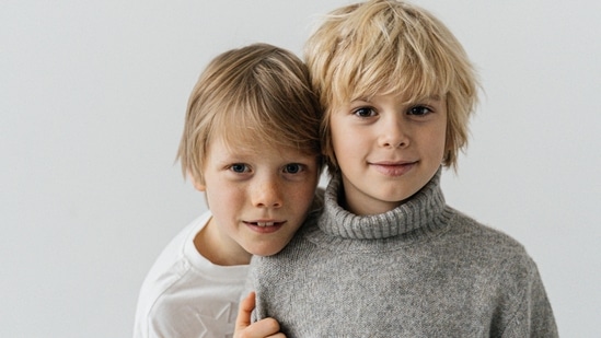 Sweaters for boys are a must-have in their winter wardrobe. (Pexels)
