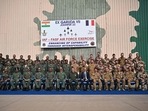 The pilots from the Indian Air Force (IAF) and French Air and Space Force (FASF) pose along with officials during their joint air force exercise 'Ex Garuda-VII' at Jodhpur, Rajasthan on November 8.(AFP) The pilots from the Indian Air Force (IAF) and French Air and Space Force (FASF) pose along with officials during their joint air force exercise 'Ex Garuda-VII' at Jodhpur, Rajasthan on November 8.(AFP)