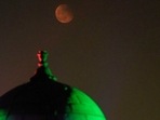 A total Lunar Eclipse or Chandra Grahan occurs when the earth comes between the sun and the moon.