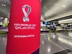 Passengers wait to collect their bags and luggage at the baggage belt area inside Hamad International Airport ahead of the World Cup soccer tournament in Doha, Qatar.