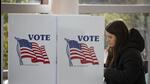A woman votes in the 2022 midterm election on Election Day at a polling location on the Michigan State University campus on Tueaday in East Lansing, Michigan. (AFP) A woman votes in the 2022 midterm election on Election Day at a polling location on the Michigan State University campus on Tueaday in East Lansing, Michigan. (AFP)