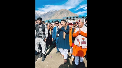 Union road transport and highways minister Nitin Gadkari greets the Bharatiya Janata Party (BJP) supporters during a public meeting ahead of the Himachal Pradesh assembly elections in Bharmour, Chamba on Tuesday. (ANI)