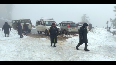 Tourists visit the World’s best Ski resort, Gulmarg, after snowfall received in the higher reaches of Kashmir valley, on Tuesday. (ANI)
