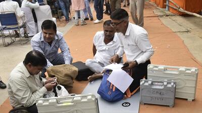 Election officials check EVMs and election materials for the panchayat election in Gurugram, Sohna and Farrukhnagar, at Girls College in Sector 14, in Gurugram on Tuesday. (Vipin Kumar/ HT Photo) Election officials check EVMs and election materials for the panchayat election in Gurugram, Sohna and Farrukhnagar, at Girls College in Sector 14, in Gurugram on Tuesday. (Vipin Kumar/ HT Photo)