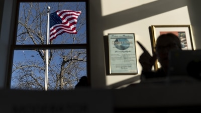 US Midterm Elections: An American flag flies outside a polling site. (AP) US Midterm Elections: An American flag flies outside a polling site. (AP)