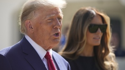 US Midterm Elections: Former President Donald Trump talks to the media with Melania Trump. (AP) US Midterm Elections: Former President Donald Trump talks to the media with Melania Trump. (AP)