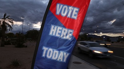 US Midterm Elections 2022: A sign reading "Vote Here Today" sways in the wind outside a polling station. (AFP) US Midterm Elections 2022: A sign reading "Vote Here Today" sways in the wind outside a polling station. (AFP)