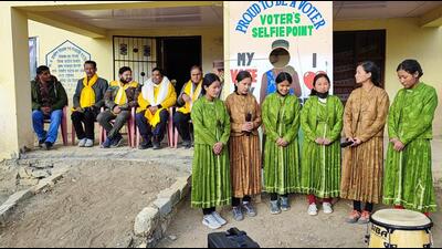 Schoolchildren presenting a folk song as the Election Commission team, led by poll observer Saroj Kumar, looks on after inspecting the highest polling station at Tashigang village in Lahaul and Spiti district of Himachal Pradesh on Monday. (HT Photo)