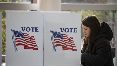 A woman votes in the 2022 midterm election on Election Day at a polling location on the Michigan State University campus on Tueaday in East Lansing, Michigan. (AFP) A woman votes in the 2022 midterm election on Election Day at a polling location on the Michigan State University campus on Tueaday in East Lansing, Michigan. (AFP)