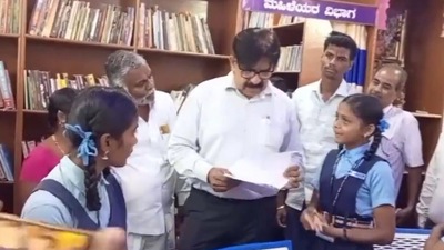 School girl confronts government official for extra library hours.