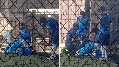 Rohit Sharma looks on as he is being treated by the physio (ANI) Rohit Sharma looks on as he is being treated by the physio (ANI)