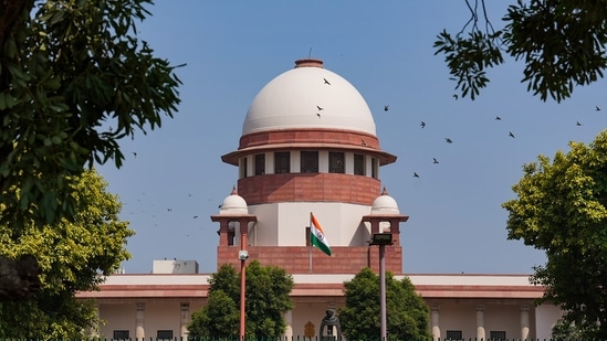 Three judges backed the EWS quota law, for it intended to uplift a class historically denied the benefits of reservation. (PTI)(HT_PRINT)