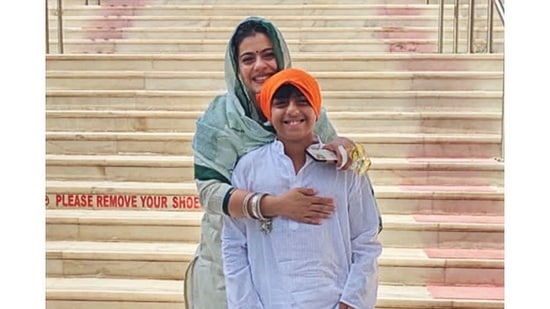 Kajol visited a Gurudwara with her son Yug Devgn. She took to her Instagram handle to share a photo with Yug and wrote, "Guru Nanak Jayanti”.(Instagram/@kajol)