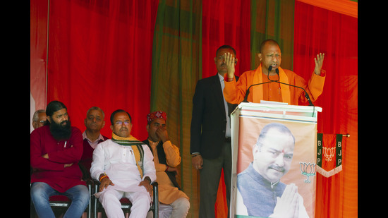 Uttar Pradesh CM Yogi Adityanath addresses an election campaign rally ahead of Himachal Pradesh assembly elections in Palampur on Tuesday. (PTI)
