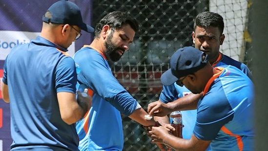 Indian team physio Kamlesh Jain and team doctor Charles Minz attend to Indian skipper Rohit Sharma after the skipper gets hit on the forearm during a practice session ahead of the match against England in the Semifinals of ICC Men's T20 World Cup 2022, in Adelaide(ANI)