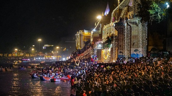 "Kashi Vishwanath temple complex was decorated with 50 tonnes of flowers on Dev Deepawali. For this, <span class='webrupee'>₹</span>80 lakh was spent by the government," read an official statement.(PTI)