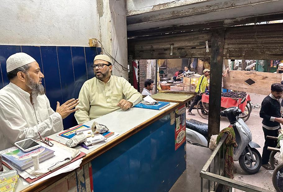 In their 50s, Saeed (left) and Fareed are sitting in their building-material shop that overlooks a madly chaotic Walled City street. They exploit the east-going evening hour to summon the tonga excursions of their childhood. In their 50s, Saeed (left) and Fareed are sitting in their building-material shop that overlooks a madly chaotic Walled City street. They exploit the east-going evening hour to summon the tonga excursions of their childhood.