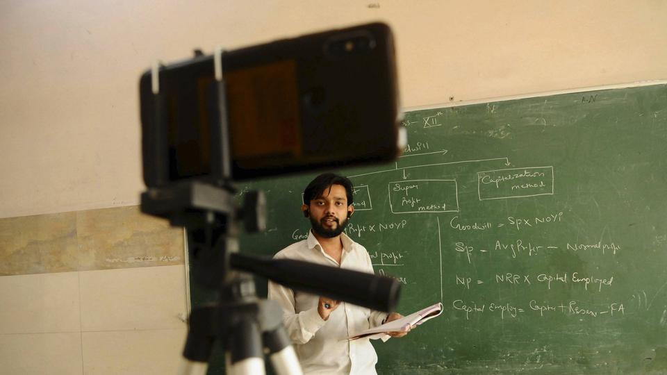 A teacher recording his video for online classes (PTI) A teacher recording his video for online classes (PTI)