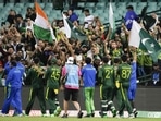 Pakistan players wave to their supporters following the T20 World Cup cricket semifinal between New Zealand and Pakistan in Sydney, Australia, Wednesday, Nov. 9, 2022. Pakistan defeated New Zealand by seven wickets. (AP Photo/Rick Rycroft)(AP)