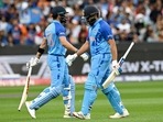 India's Captain Rohit Sharma (R) departs after his dismissal as Virat Kohli walk onto the field(AFP) India's Captain Rohit Sharma (R) departs after his dismissal as Virat Kohli walk onto the field(AFP)