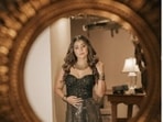 Hina Khan is an absolute fashionista. The actor keeps sharing snippets from her fashion diaries with her Instagram family on a regular basis. Be it an ethnic ensemble or a casual attire, the actor knows how to drop major cues for her fans to refer to, while making them drool to her looks. Hina, a day back, shared a slew of pictures of herself looking like the epitome of grace in a stunning black metallic ensemble, as she posed through the mirror on the wall.(Instagram/@realhinakhan) Hina Khan is an absolute fashionista. The actor keeps sharing snippets from her fashion diaries with her Instagram family on a regular basis. Be it an ethnic ensemble or a casual attire, the actor knows how to drop major cues for her fans to refer to, while making them drool to her looks. Hina, a day back, shared a slew of pictures of herself looking like the epitome of grace in a stunning black metallic ensemble, as she posed through the mirror on the wall.(Instagram/@realhinakhan)