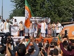 Leader of Opposition in Delhi Legislative Assembly Ramvir Singh Bidhuri with Delhi Bharatiya Janata Party (BJP) chief Adesh Gupta and party leader Harsh Vardhan flags off the campaigning vehicles for the Municipal Corporation of Delhi (MCD) elections, as Union Minister of Petroleum and Natural Gas Hardeep Singh Puri and Union Minister of State for External Affairs Minister Meenakashi Lekhi look on, at Delhi party office, in New Delhi on Monday. (ANI Photo)