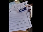 The image, taken from the LinkedIn post, shows resumes with chocolates and notes. The image, taken from the LinkedIn post, shows resumes with chocolates and notes.